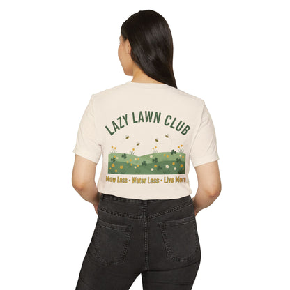 Person wearing a beige t-shirt with 'Lazy Lawn Club' design on the back.